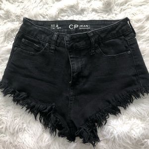 Distressed hem black shorts